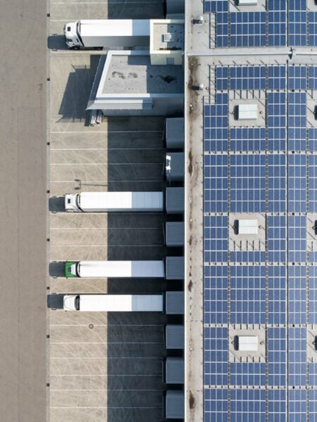 Facility with solar panels on roof