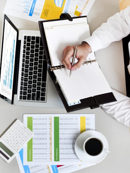 Businessman in office taking notes