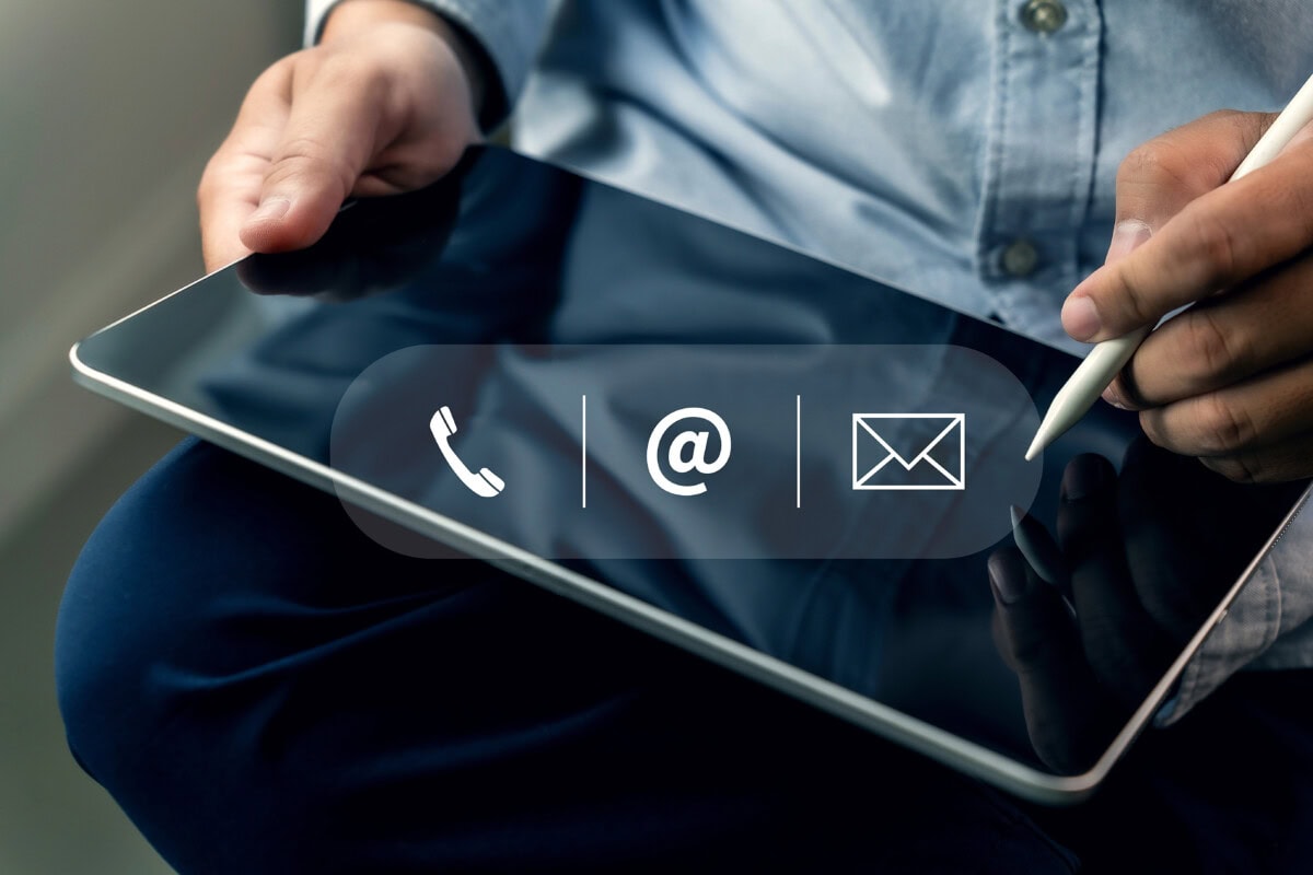 Person using tablet to contact support